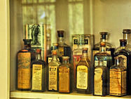 Square House Medicine Bottle Display