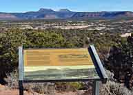 Bears Ears in the distance and story board - Blanding, Utah